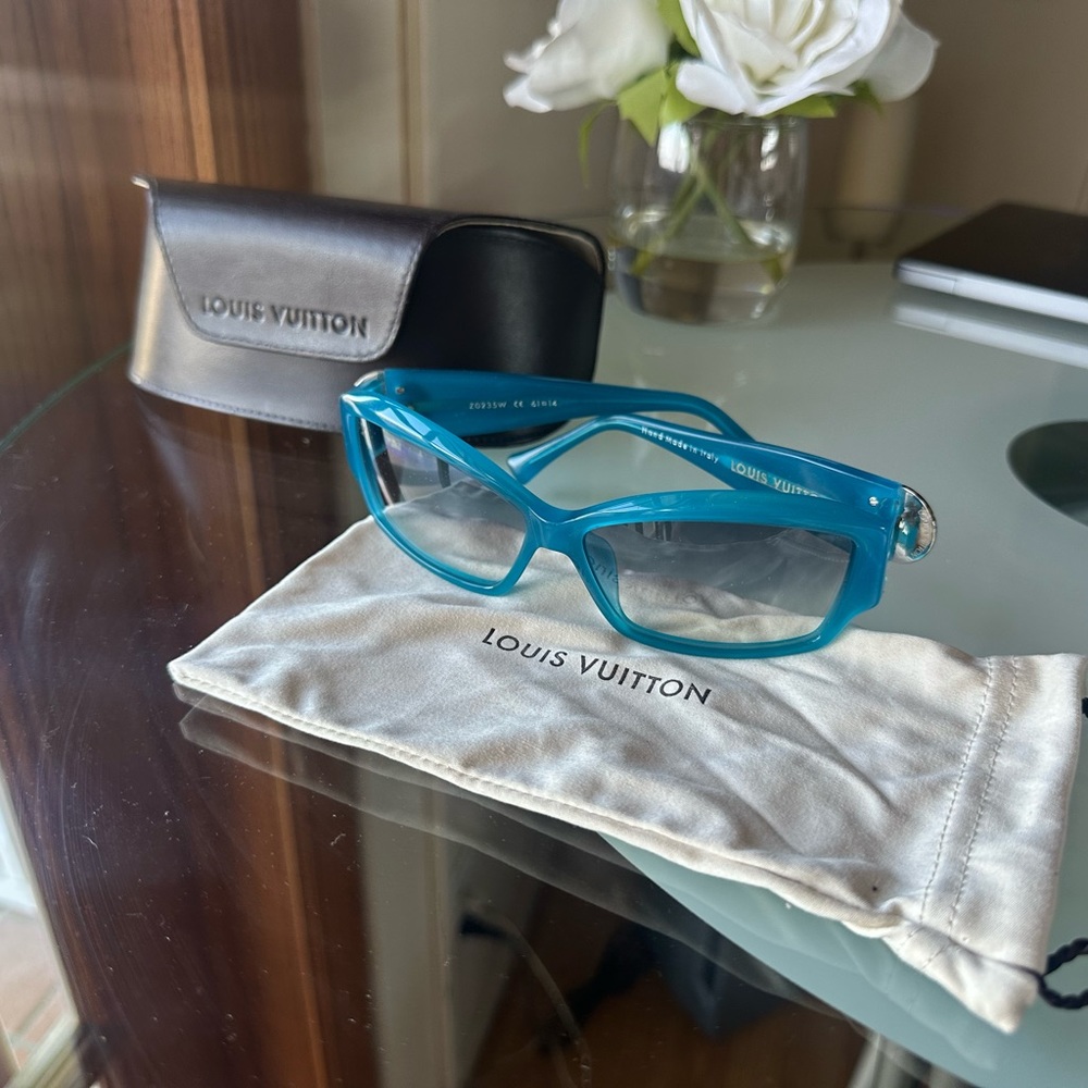 Authentic Luis Vuitton blue sunglasses Great condition. Barely worn!